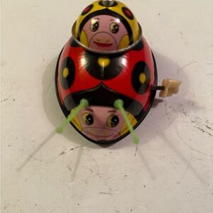 Vintage SUZUKI LADYBUG and BELL
Wind up Tin Toy Japan Rare WORKS!